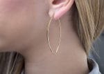 Long hoop gold earrings - Image 4