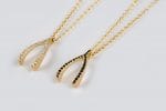 Diamond wishbone gold necklace