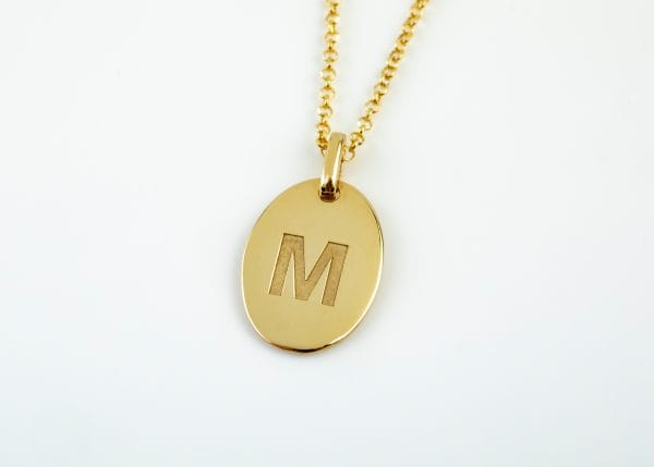 IMG_1563 Oval initial gold disk necklace - Image 1