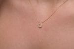 Reversed gold horseshoe necklace - Image 5