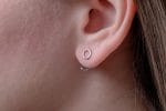 Circle huggie gold earrings - Image 5