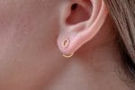 Circle huggie gold earrings - Image 3