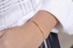 Floating bar gold bracelet
