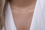 Floating Chevron V necklace with diamonds