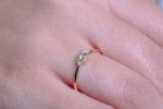 Dainty three diamond gold ring