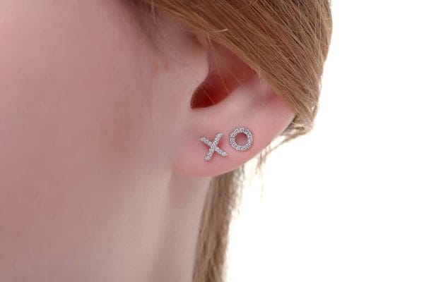 Diamond XO studs 1 Diamond XO gold stud earrings - Image 1