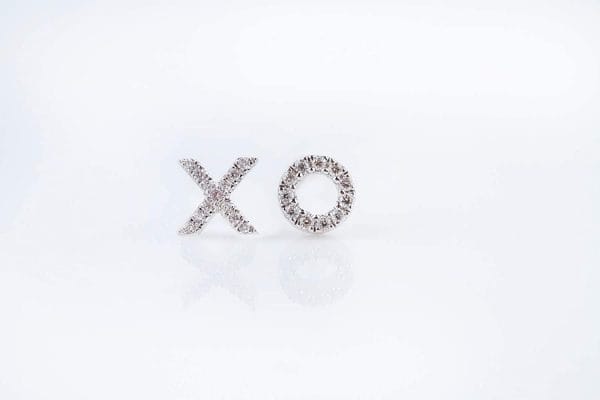 Diamond XO gold stud earrings - Image 9