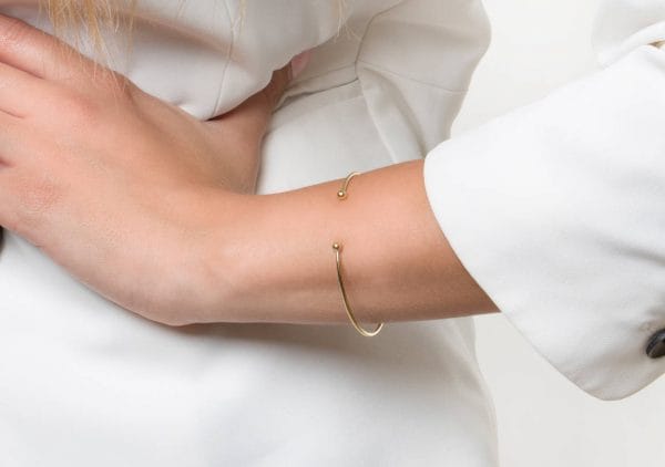 Two balls bangle bracelet 1 Two balls gold bangle bracelet - Image 1