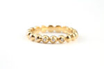 Solid gold dotted diamond ring