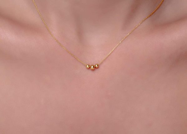 Floating ball gold necklace - Image 4