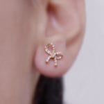 Diamond bow gold earrings