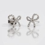 Diamond bow gold earrings - Image 7