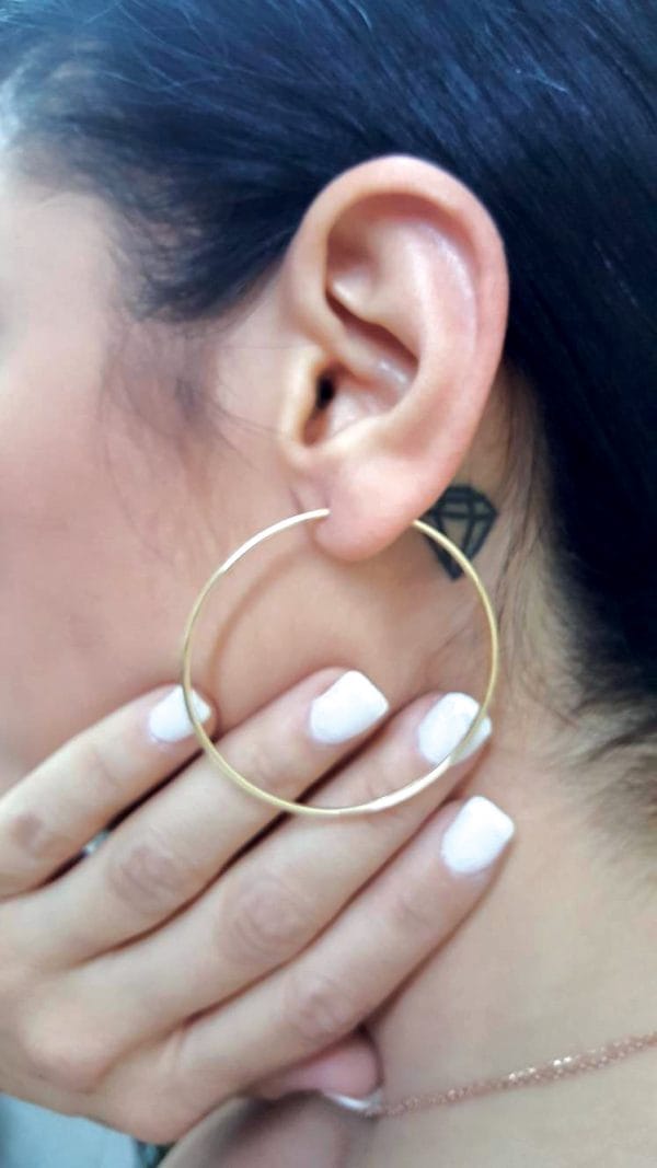 Large solid gold hoop earrings - Image 2