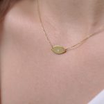 Minimalist evil eye with a diamond