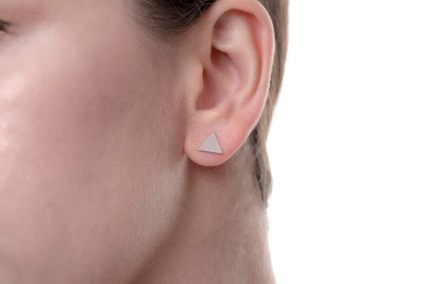 Tiny triangle gold stud earrings - Image 5