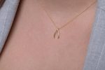 Tiny wishbone gold necklace