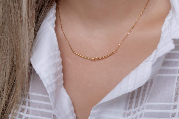 Unique gold knot bar necklace - Image 1