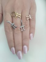 Gold diamond pi earrings - Image 11