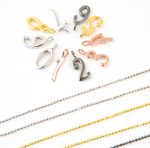 Symbolic number gold necklace - Image 2