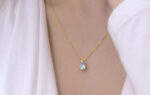 Blue topaz necklace with a tiny diamond