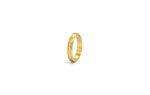 Wedding ring in solid gold with decorative line.